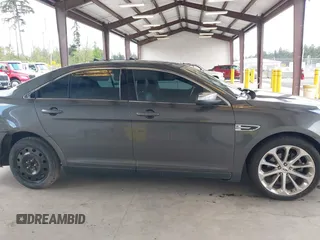 2016 Ford Taurus Limited z VIN 1FAHP2F84GG141829, wystawiony jako IAAI lot #42179934 z przebiegiem 144 191 mil mil oraz . Historia ofert i sprzedaży dostępna na DreamBid. Obrazek 14.