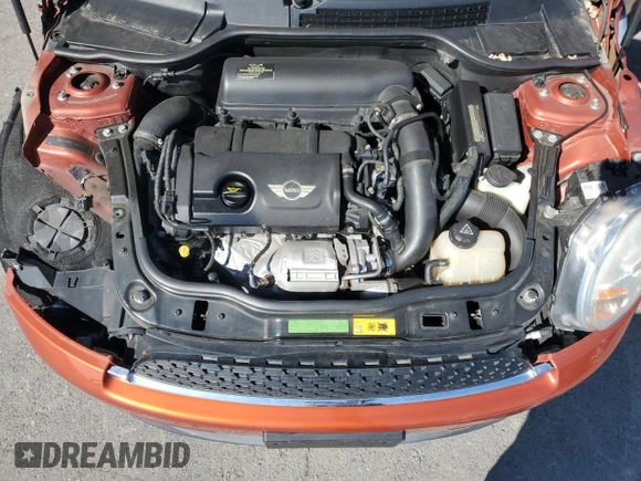 2011 MINI Hardtop S with VIN WMWSV3C57BTY11831, listed as a Copart auction lot 51985845 with 70,690 mi miles and Salvage Title. Bid and sale history available at DreamBid. Image 11.