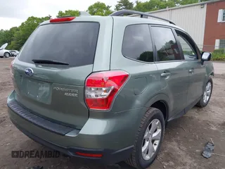 2016 Subaru Forester Premium with VIN JF2SJADC8GH472802, listed as a IAAI auction lot 42302456 with 51,165 mi miles and . Bid and sale history available at DreamBid. Image 4.