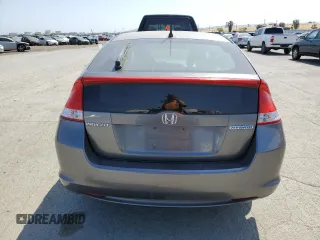 2010 Honda Insight EX with VIN JHMZE2H7XAS021268, listed as a Copart auction lot 54179245 with 211,561 mi miles and Salvage Title. Bid and sale history available at DreamBid. Image 6.