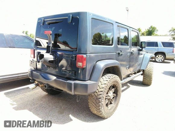 2013 Jeep Wrangler Unlimited Sport z VIN 1C4BJWDG1DL660844, wystawiony jako IAAI lot #42347284 z przebiegiem 168 709 mil mil oraz . Historia ofert i sprzedaży dostępna na DreamBid. Obrazek 4.