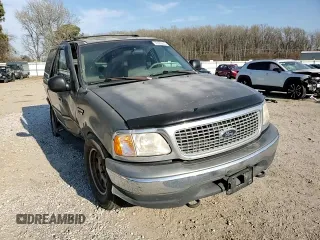 1999 Ford Expedition XLT z VIN 1FMPU18L5XLB14460, wystawiony jako Copart lot #50680605 z przebiegiem Nie podano mil oraz Szkoda całkowita • Salvage title. Historia ofert i sprzedaży dostępna na DreamBid. Obrazek 12.