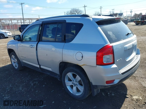 2012 Jeep Compass Sport with VIN 1C4NJDBB0CD590268, listed as a IAAI auction lot 41856474 with 148,627 mi miles. Bid and sale history available at carsss.com. Image 3.