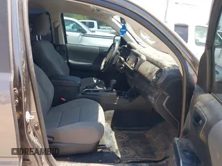 2021 Toyota Tacoma SR with VIN 3TYAX5GN3MT015565, listed as a IAAI auction lot 42241436 with 46,921 mi miles and . Bid and sale history available at DreamBid. Image 5.