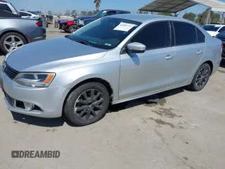 2011 Volkswagen Jetta SE with VIN 3VWDZ7AJ4BM394140, listed as a IAAI auction lot 42284735 with 177,495 mi miles and . Bid and sale history available at DreamBid. Image 2.