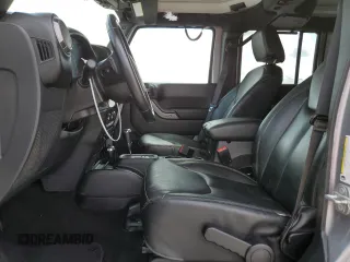 2018 Jeep Wrangler JK Unlimited Sport S with VIN 1C4BJWDG9JL860379, listed as a Copart auction lot 45628665 with 55,515 mi miles and Non Repairable. Bid and sale history available at carsss.com. Image 7.