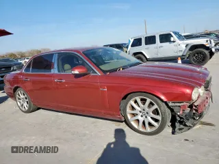 2008 Jaguar XJ with VIN SAJWA79B58SH20211, listed as a Copart auction lot 46951055 with 144,655 mi miles and Salvage Title. Bid and sale history available at carsss.com. Image 4.