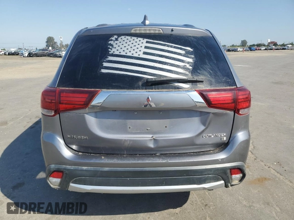 2018 Mitsubishi Outlander ES z VIN JA4AZ3A34JJ003445, wystawiony jako Copart lot #55850775 z przebiegiem 133 644 mil mil oraz Szkoda całkowita • Salvage title. Historia ofert i sprzedaży dostępna na DreamBid. Obrazek 6.
