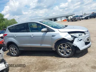 2013 Ford Escape SEL z VIN 1FMCU9H94DUD19842, wystawiony jako IAAI lot #42399577 z przebiegiem 176 257 mil mil oraz . Historia ofert i sprzedaży dostępna na DreamBid. Obrazek 14.