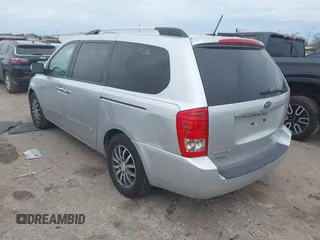 2012 Kia Sedona EX with VIN KNDMH4C74C6497243, listed as a IAAI auction lot 41368080 with 218,806 mi miles. Bid and sale history available at carsss.com. Image 3.