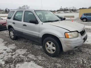 2004 Ford Escape XLS with VIN 1FMYU02164KA15802, listed as a Copart auction lot 43437495 with 255,846 mi miles and Clean Title. Bid and sale history available at DreamBid. Image 4.