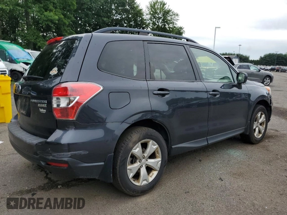 2014 Subaru Forester Premium with VIN JF2SJAEC5EH517030, listed as a Copart auction lot 63153595 with 211,242 mi miles and Salvage title. Bid and sale history available at DreamBid. Image 3.