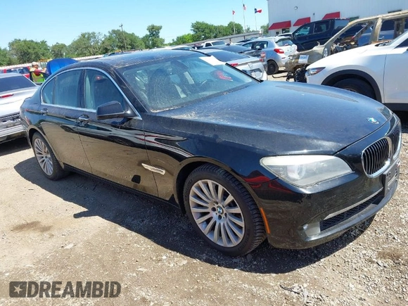 2012 BMW 7 Series 750i with VIN WBAKA8C50CCY37892, listed as a IAAI auction lot 42080313 with 148,058 mi miles. Bid and sale history available at carsss.com. Image 1.