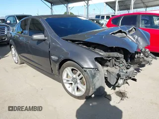 2008 Pontiac G8 with VIN 6G2ER57798L988697, listed as a IAAI auction lot 41690384 with 166,798 mi miles. Bid and sale history available at carsss.com. Image 1.