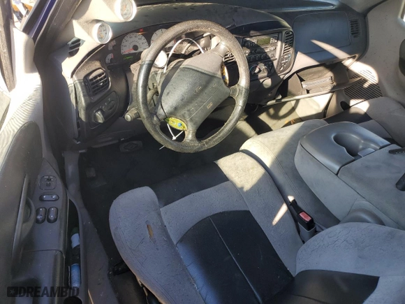 2004 Ford F-150 Heritage Lightning with VIN 2FTRF07394CA62825, listed as a Copart auction lot 45794935 with 117,044 mi miles and Salvage Title. Bid and sale history available at carsss.com. Image 8.