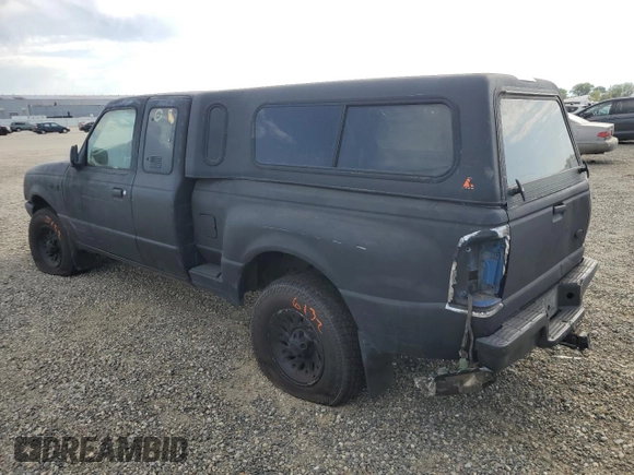 1999 Ford Ranger XL with VIN 1FTZR15V1XPB88455, listed as a Copart auction lot 61976915 with 117,711 mi miles and Salvage title. Bid and sale history available at DreamBid. Image 2.