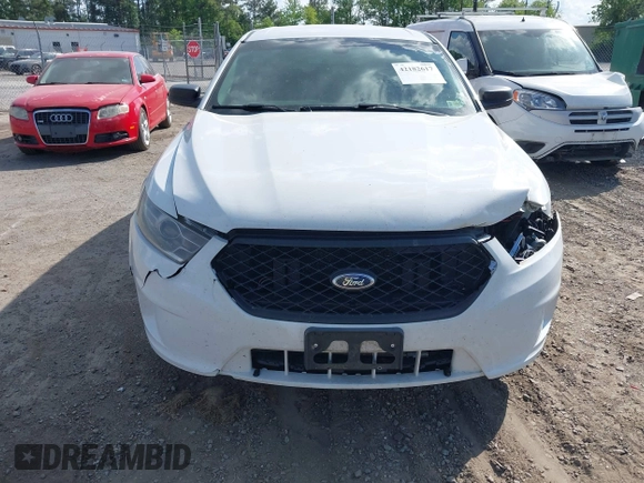 2015 Ford Police Interceptor z VIN 1FAHP2MK7FG203950, wystawiony jako IAAI lot #42182617 z przebiegiem 165 426 mil mil oraz . Historia ofert i sprzedaży dostępna na DreamBid. Obrazek 12.