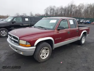 2002 Dodge Dakota SLT with VIN 1B7HL48N62S694380, listed as a IAAI auction lot 42008125 with 152,421 mi miles. Bid and sale history available at carsss.com. Image 2.