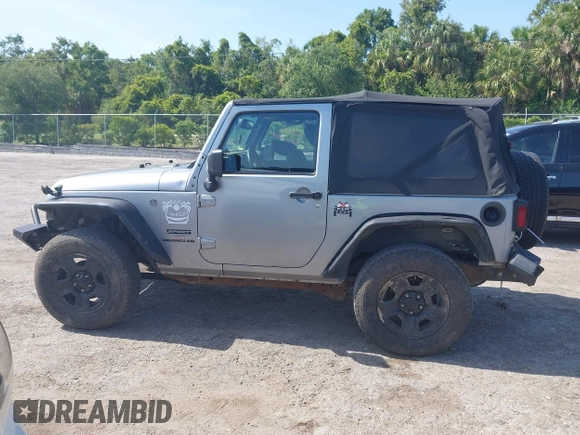 2014 Jeep Wrangler Sport with VIN 1C4AJWAG0EL126459, listed as a IAAI auction lot 42286803 with 179,025 mi miles and . Bid and sale history available at DreamBid. Image 14.