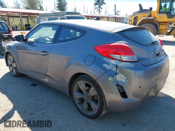 2013 Hyundai Veloster w/Black Int with VIN KMHTC6AD8DU103122, listed as a IAAI auction lot 42068175 with 123,512 mi miles and . Bid and sale history available at DreamBid. Image 3.