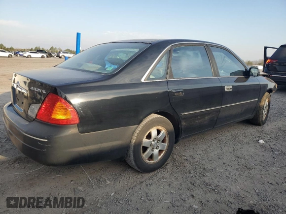 2001 Toyota Avalon XL z VIN 4T1BF28B61U175674, wystawiony jako Copart lot #49913765 z przebiegiem 170 245 mil mil oraz Tytuł czysty. Historia ofert i sprzedaży dostępna na DreamBid. Obrazek 3.