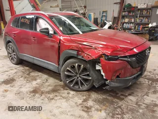 2023 Mazda CX-50 S Premium Plus with VIN 7MMVABEM8PN105411, listed as a IAAI auction lot 41378915 with 34,866 mi miles and . Bid and sale history available at DreamBid. Image 1.