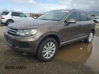 2011 Volkswagen Touareg Sport with VIN WVGFF9BP6BD005072, listed as a Copart auction lot 45710055 with 130,683 mi miles and Salvage Title. Bid and sale history available at DreamBid. Image 1.