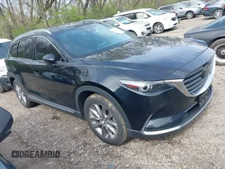2020 Mazda CX-9 Grand Touring with VIN JM3TCBDY3L0419049, listed as a IAAI auction lot 41948393 with 70,163 mi miles and . Bid and sale history available at DreamBid. Image 1.