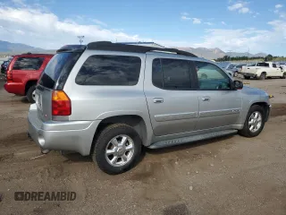 2005 GMC Envoy SLT with VIN 1GKET16M656181157, listed as a Copart auction lot 72980874 with 243,975 mi miles and Salvage Title. Bid and sale history available at DreamBid. Image 3.