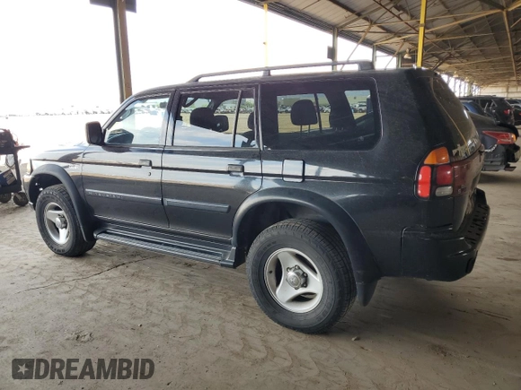 2001 Mitsubishi Montero ES z VIN JA4LS21H11P003533, wystawiony jako Copart lot #54403045 z przebiegiem 241 477 mil mil oraz Szkoda całkowita • Salvage title. Historia ofert i sprzedaży dostępna na DreamBid. Obrazek 2.