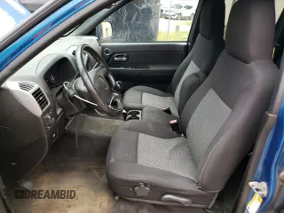 2011 GMC Canyon SLE1 with VIN 1GTH6MFE3B8119385, listed as a Copart auction lot 70492994 with 105,305 mi miles and Salvage Title. Bid and sale history available at carsss.com. Image 7.