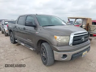 2013 Toyota Tundra z VIN 5TFEY5F1XDX143823, wystawiony jako IAAI lot #42143009 z przebiegiem 289 734 mil mil oraz . Historia ofert i sprzedaży dostępna na DreamBid. Obrazek 1.