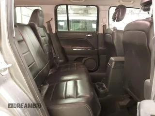 2014 Jeep Patriot Limited with VIN 1C4NJRCBXED546471, listed as a IAAI auction lot 41744915 with 113,691 mi miles and . Bid and sale history available at DreamBid. Image 8.