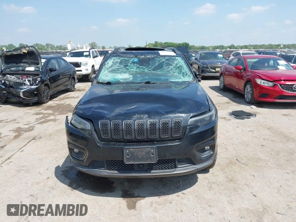 2021 Jeep Cherokee Latitude Lux with VIN 1C4PJLMXXMD134565, listed as a IAAI auction lot 42044643 with 84,611 mi miles and . Bid and sale history available at DreamBid. Image 12.