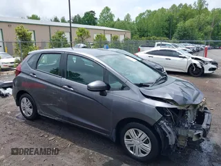 2019 Honda Fit LX z VIN 3HGGK5H42KM748117, wystawiony jako IAAI lot #42190794 z przebiegiem 54 614 mil mil oraz . Historia ofert i sprzedaży dostępna na DreamBid. Obrazek 1.