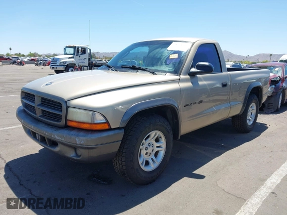 2002 Dodge Dakota with VIN 1B7FL16X72S642881, listed as a IAAI auction lot 42153560 with 220,917 mi miles and . Bid and sale history available at carsss.com. Image 17.