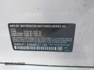2021 BMW 3 Series 330e with VIN 3MW5P7J00M8C21180, listed as a IAAI auction lot 41451850 with 70,459 mi miles. Bid and sale history available at carsss.com. Image 9.