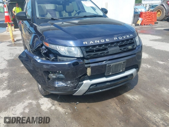 2015 Land Rover Range Rover Evoque Dynamic z VIN SALVT2BG1FH018285, wystawiony jako IAAI lot #42687773 z przebiegiem 92 273 mil mil oraz . Historia ofert i sprzedaży dostępna na DreamBid. Obrazek 6.