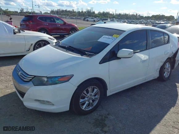 2011 Honda Insight EX with VIN JHMZE2H73BS009609, listed as a IAAI auction lot 41668074 with 252,432 mi miles. Bid and sale history available at carsss.com. Image 2.