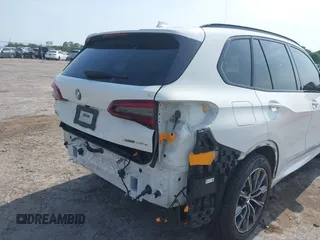 2021 BMW X5 xDrive45e with VIN 5UXTA6C08M9F38909, listed as a IAAI auction lot 42172536 with 71,741 mi miles and . Bid and sale history available at DreamBid. Image 18.