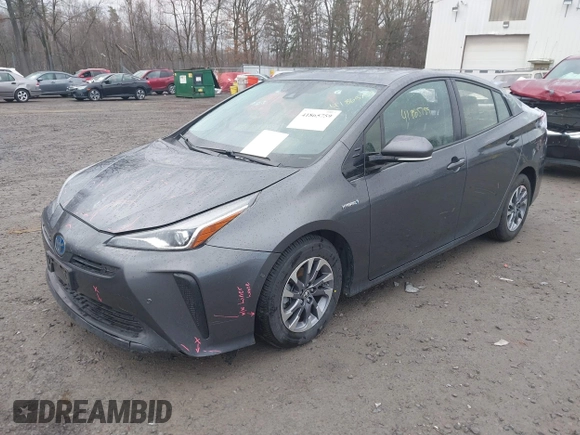 2019 Toyota Prius L Eco z VIN JTDKARFU7K3077941, wystawiony jako IAAI lot #41865759 z przebiegiem 254 612 mil mil oraz . Historia ofert i sprzedaży dostępna na DreamBid. Obrazek 17.