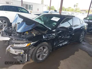 2019 Honda Insight EX with VIN 19XZE4F52KE014737, listed as a IAAI auction lot 42100837 with 35,402 mi miles and . Bid and sale history available at carsss.com. Image 2.