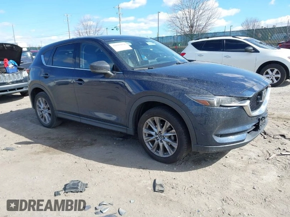 2020 Mazda CX-5 Grand Touring with VIN JM3KFBDM2L0768770, listed as a IAAI auction lot 41695058 with 44,192 mi miles. Bid and sale history available at carsss.com. Image 1.