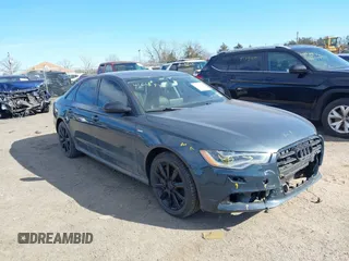 2012 Audi A6 3.0T Premium Plus with VIN WAUBGAFCXCN005335, listed as a IAAI auction lot 41603934 with 167,406 mi miles. Bid and sale history available at carsss.com. Image 1.