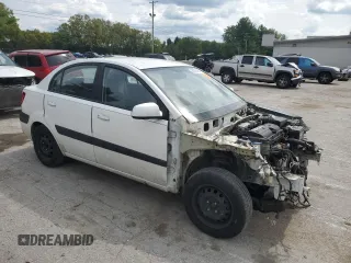 2009 Kia Rio LX with VIN KNADE223996526222, listed as a Copart auction lot 69976484 with 318,702 mi miles and Salvage Title. Bid and sale history available at DreamBid. Image 4.