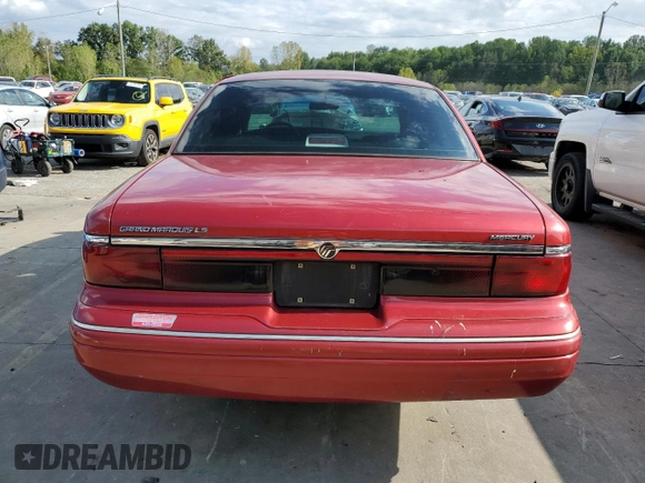 1996 Mercury Grand Marquis LS z VIN 2MELM75W5TX644041, wystawiony jako Copart lot #73594874 z przebiegiem 130 979 mil mil oraz Nie do naprawy • Non repairable. Historia ofert i sprzedaży dostępna na DreamBid. Obrazek 6.