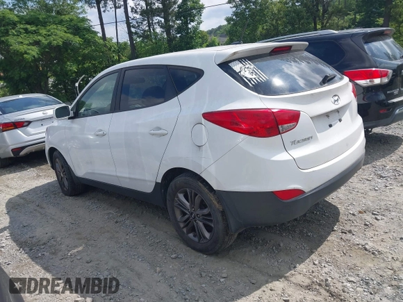2015 Hyundai Tucson GLS with VIN KM8JT3AF6FU982128, listed as a IAAI auction lot 42227235 with 141,612 mi miles and . Bid and sale history available at DreamBid. Image 3.