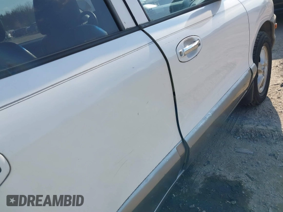 2002 Hyundai Santa Fe GLS with VIN KM8SC73D32U249942, listed as a IAAI auction lot 41660482 with 151,164 mi miles. Bid and sale history available at carsss.com. Image 14.