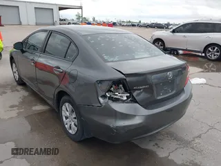 2012 Honda Civic LX z VIN 2HGFB2F51CH600546, wystawiony jako IAAI lot #41920265 z przebiegiem 196 599 mil mil oraz . Historia ofert i sprzedaży dostępna na DreamBid. Obrazek 3.