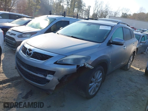 2010 Mazda CX-9 Touring with VIN JM3TB2MA5A0202993, listed as a IAAI auction lot 41654243 with 172,453 mi miles and . Bid and sale history available at DreamBid. Image 2.